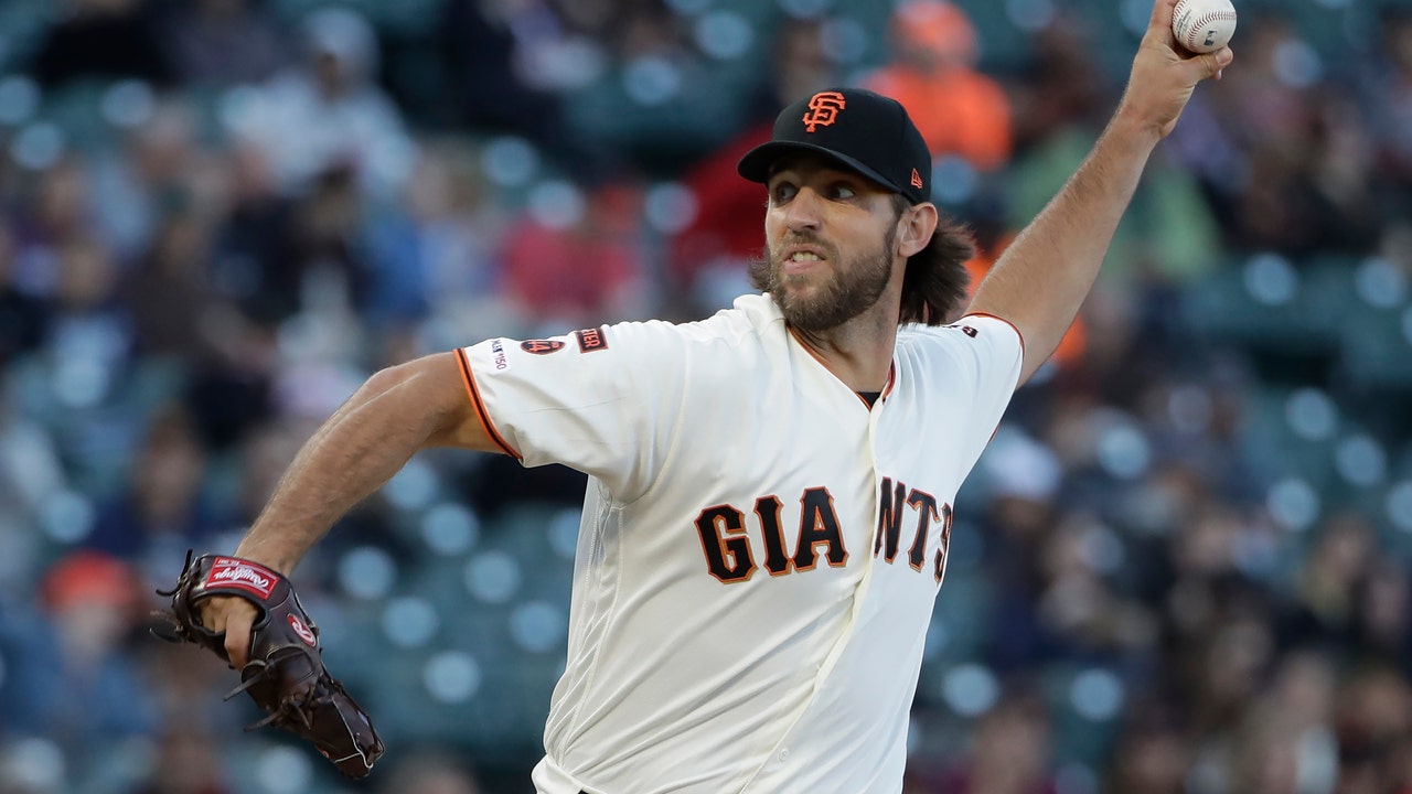 Bumgarner strikes out 11 in Giants' 4-2 win over Rockies